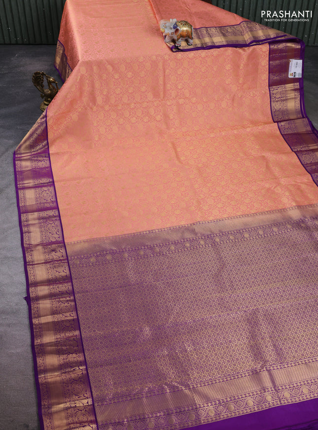 Pure kanchipuram silk saree peach pink and purple with allover zari woven brocade weaves and rich zari woven border