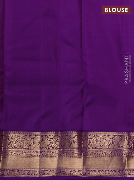 Pure kanchipuram silk saree peach pink and purple with allover zari woven brocade weaves and rich zari woven border