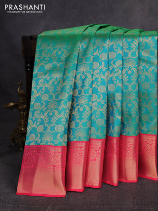 Pure kanchipuram silk saree teal green and pink with allover zari woven brocade weaves and zari woven korvai border