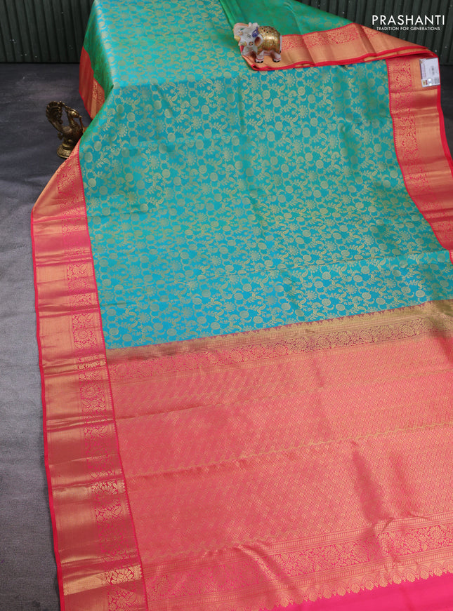 Pure kanchipuram silk saree teal green and pink with allover zari woven brocade weaves and zari woven korvai border