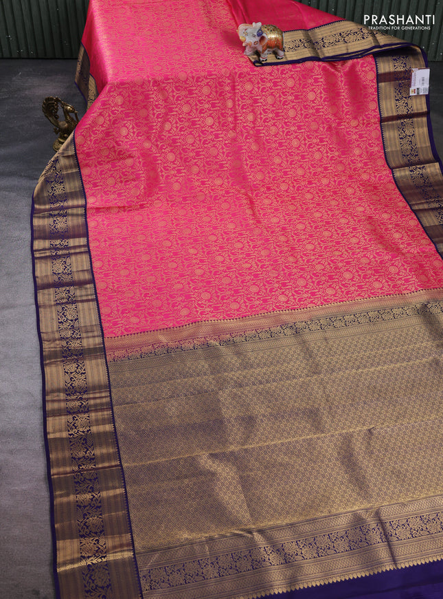 Pure kanchipuram silk saree pink and navy blue with allover zari woven brocade weaves and zari woven border