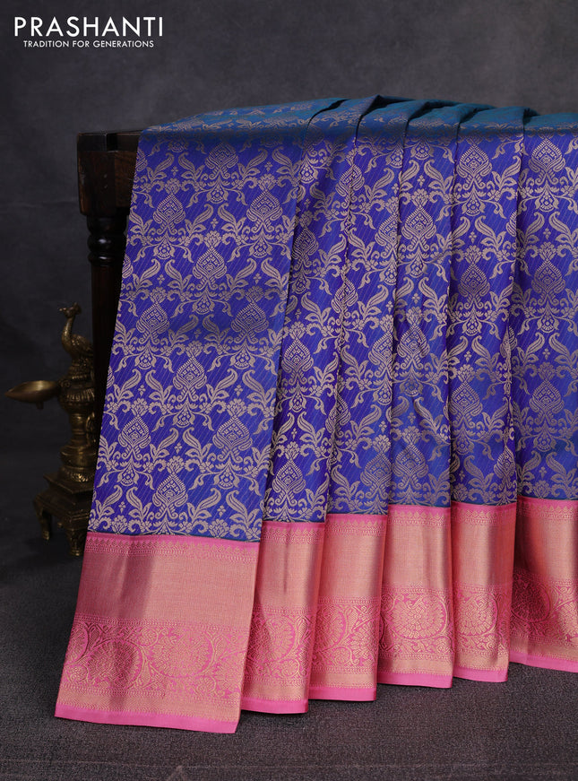 Pure kanchipuram silk saree peacock blue and mauve pink with allover zari woven brocade weaves and rich zari woven border