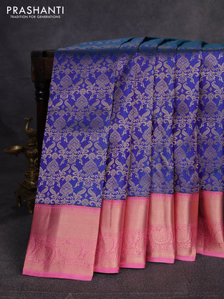 Pure kanchipuram silk saree peacock blue and mauve pink with allover zari woven brocade weaves and rich zari woven border