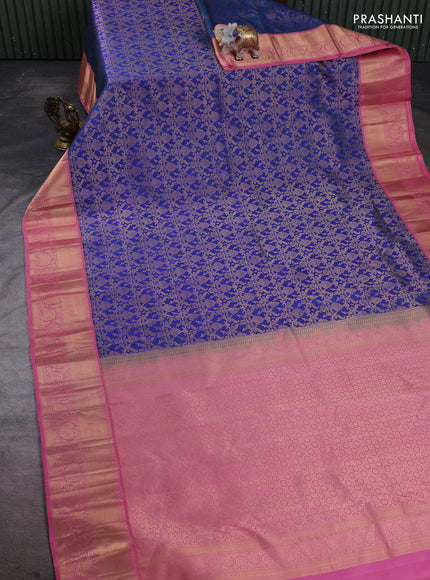 Pure kanchipuram silk saree peacock blue and mauve pink with allover zari woven brocade weaves and rich zari woven border
