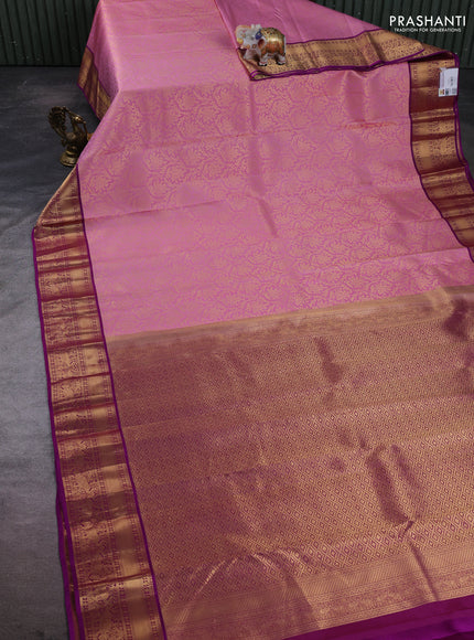 Pure kanchipuram silk saree light pink and purple with allover zari woven brocade weaves and zari woven border