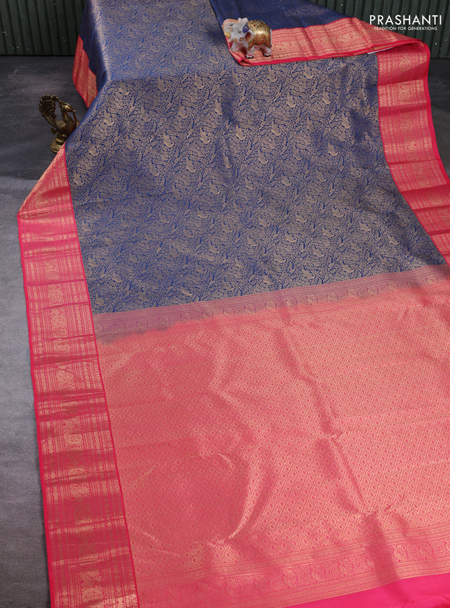 Pure kanchipuram silk saree peacock blue and pink with allover zari woven brocade weaves and zari woven korvai border