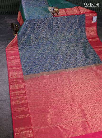 Pure kanchipuram silk saree peacock green and pink with allover zari woven brocade weaves and zari woven korvai border