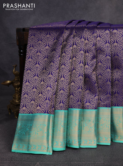 Pure kanchipuram silk saree navy blue and teal green with allover zari woven brocade weaves and zari woven border