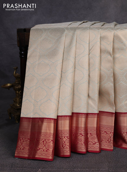Pure kanchipuram silk saree mild pista green and maroon with allover zari woven brocade weaves and rich zari woven border