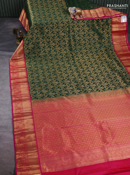 Pure kanchipuram silk saree bottle green and pink with allover zari woven brocade weaves and rich zari woven border