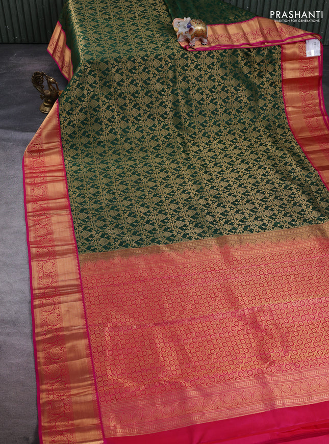 Pure kanchipuram silk saree bottle green and pink with allover zari woven brocade weaves and rich zari woven border