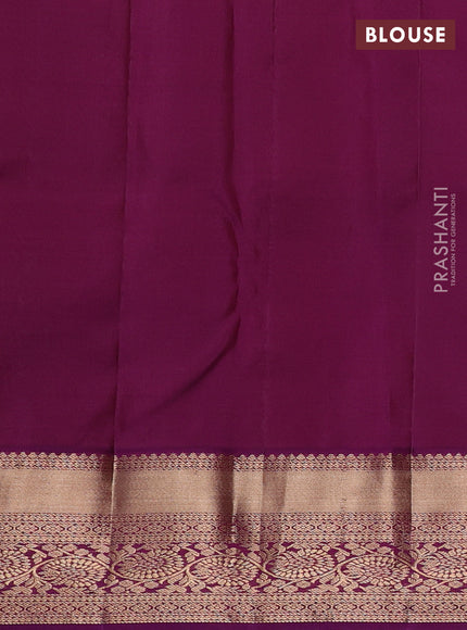 Pure kanchipuram silk saree teal green and purple with allover zari woven brocade weaves and rich zari woven border