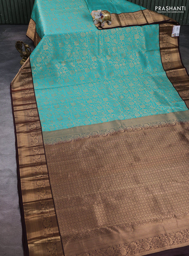 Pure kanchipuram silk saree teal green and coffee brown with allover zari woven brocade weaves and zari woven border