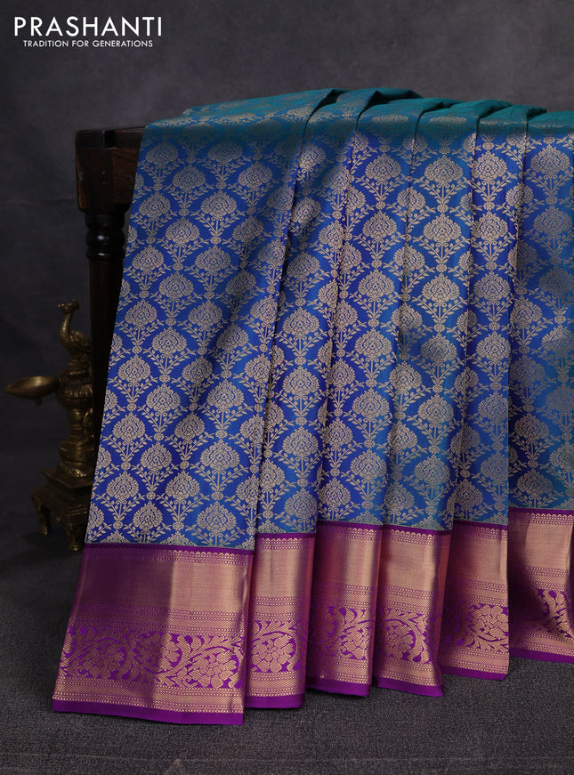 Pure kanchipuram silk saree peacock blue and purple with allover zari woven brocade weaves and rich zari woven border