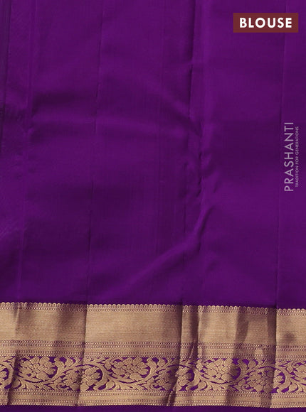 Pure kanchipuram silk saree light green and purple with allover zari woven brocade weaves and rich zari woven border