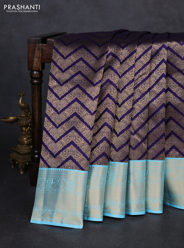 Pure kanchipuram silk saree deep violet and teal blue with allover zari woven brocade weaves and zari woven korvai border