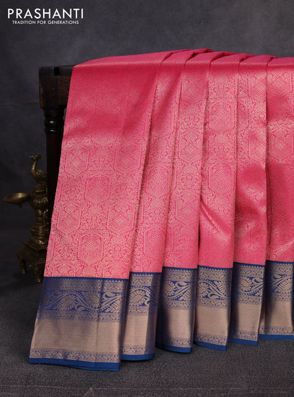 Pure kanchipuram silk saree pink and peacock blue with allover zari woven brocade weaves and rich zari woven border