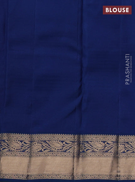 Pure kanchipuram silk saree pink and peacock blue with allover zari woven brocade weaves and rich zari woven border