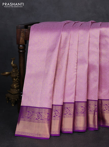 Pure kanchipuram silk saree lavender and purple with allover zari woven brocade weaves and rich zari woven border