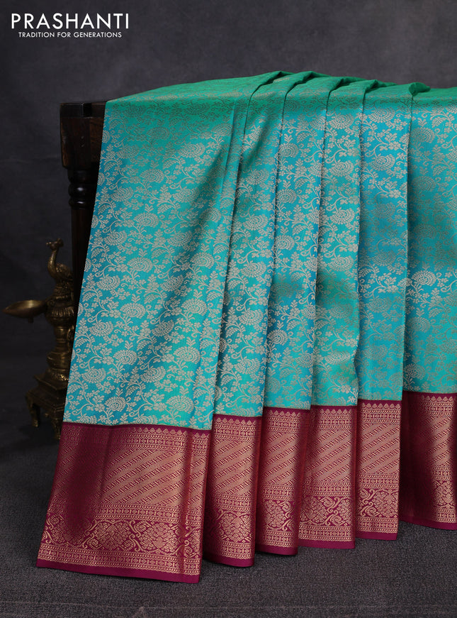 Pure kanchipuram silk saree teal green and wine shade with allover zari woven brocade weaves and zari woven border