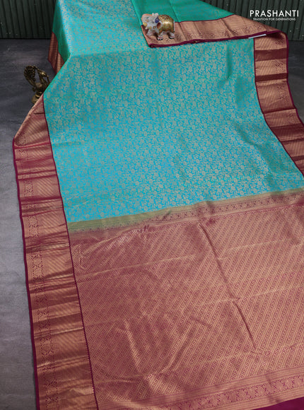 Pure kanchipuram silk saree teal green and wine shade with allover zari woven brocade weaves and zari woven border