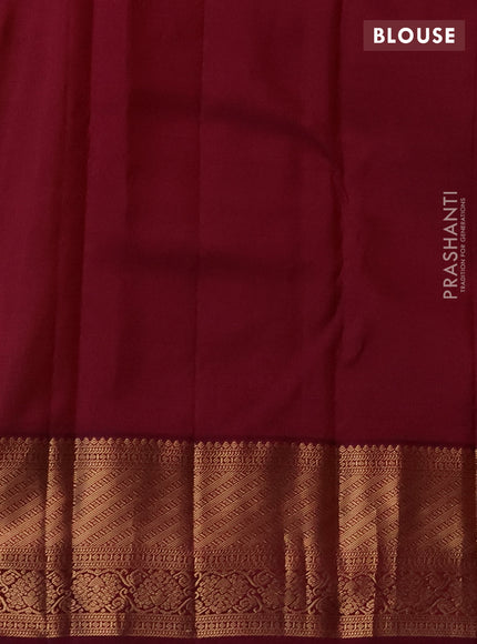 Pure kanchipuram silk saree yellow and dark magenta pink with allover zari woven brocade weaves and zari woven korvai border
