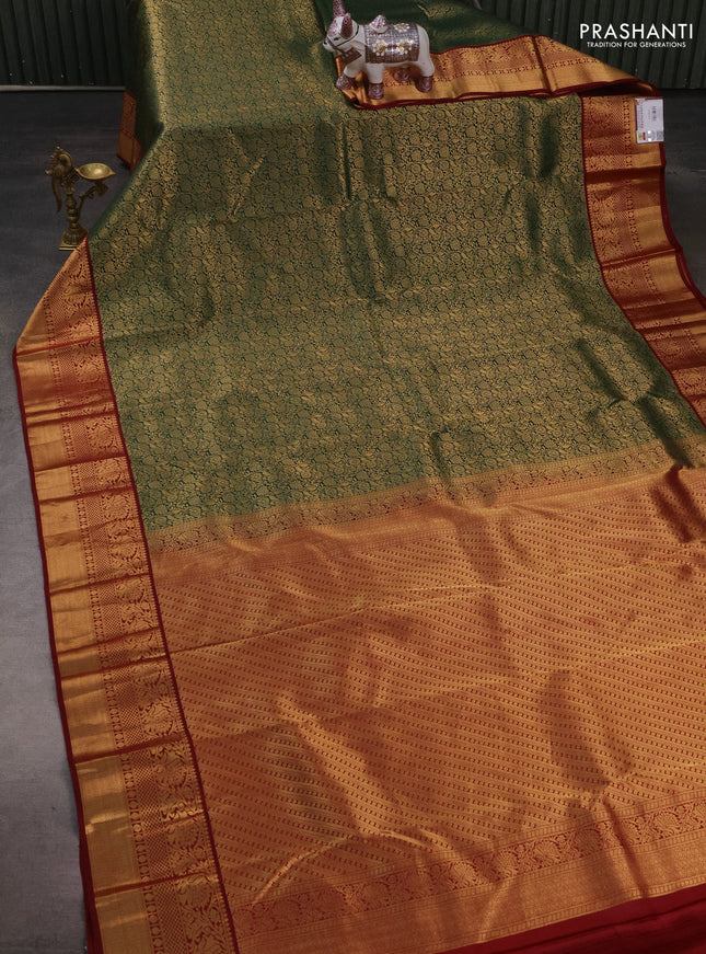 Pure kanchipuram silk saree bottle green and maroon with allover zari woven brocade weaves and zari woven border
