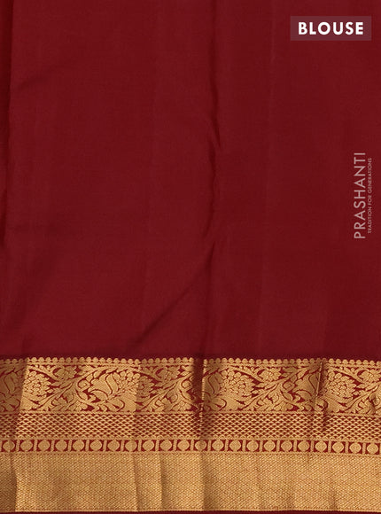 Pure kanchipuram silk saree bottle green and maroon with allover zari woven brocade weaves and zari woven border