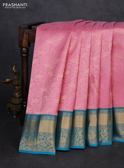 Pure kanchipuram silk saree light pink and teal blue with allover zari woven brocade weaves and rich zari woven border