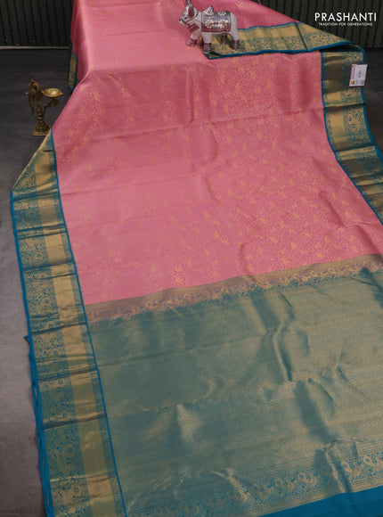 Pure kanchipuram silk saree light pink and teal blue with allover zari woven brocade weaves and rich zari woven border