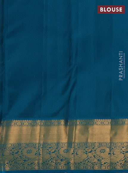 Pure kanchipuram silk saree light pink and teal blue with allover zari woven brocade weaves and rich zari woven border