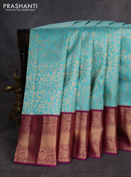 Pure kanchipuram silk saree teal blue and purple with allover zari woven brocade weaves and rich zari woven korvai border