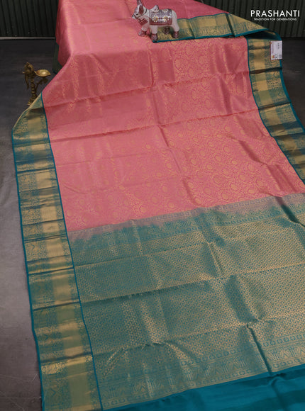 Pure kanchipuram silk saree mauve pink and teal green with allover zari woven brocade weaves and rich zari woven border