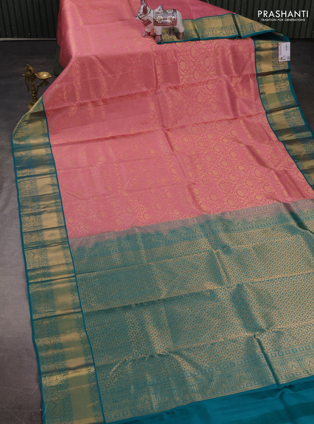 Pure kanchipuram silk saree mauve pink and teal green with allover zari woven brocade weaves and rich zari woven border
