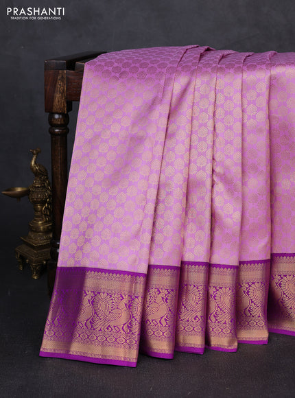 Pure kanchipuram silk saree lavender and purple with allover zari woven brocade pattern and zari woven korvai border