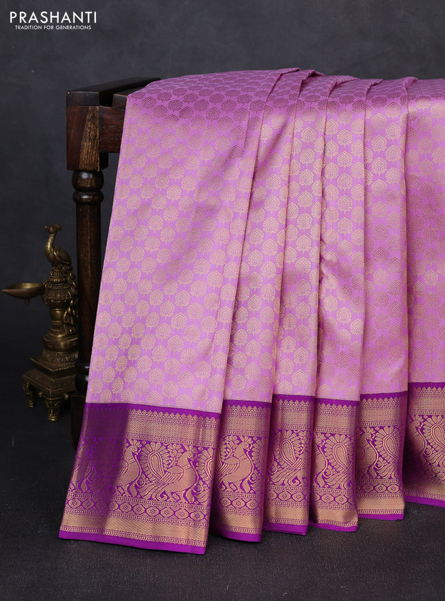 Pure kanchipuram silk saree lavender and purple with allover zari woven brocade pattern and zari woven korvai border