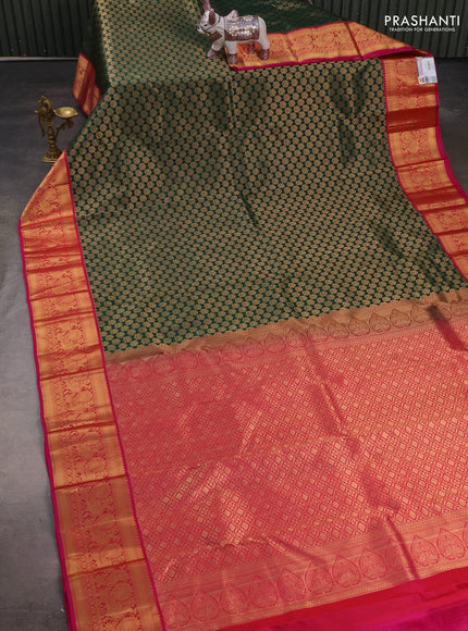 Pure kanchipuram silk saree bottle green and pink with allover zari woven brocade pattern and zari woven korvai border