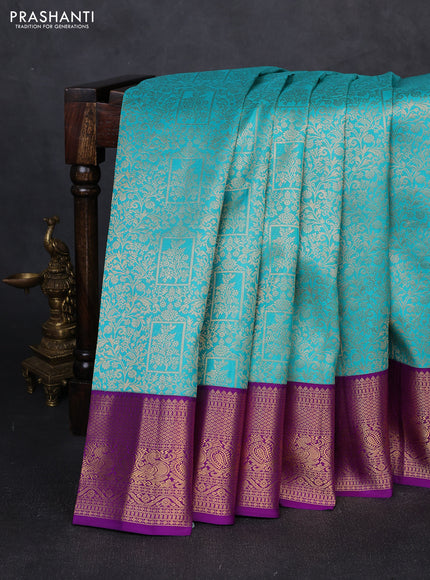 Pure kanchipuram silk saree teal blue and purple with allover zari woven brocade weaves and zari woven korvai border
