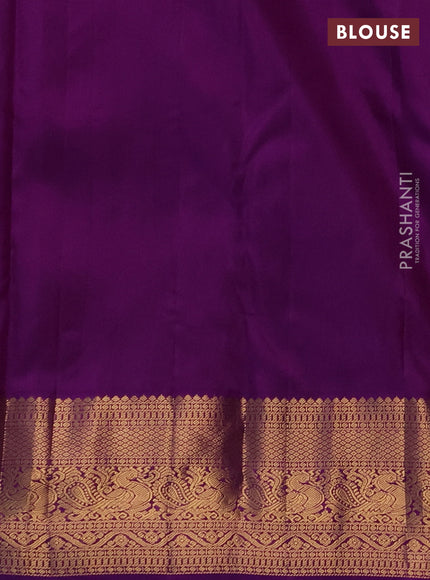 Pure kanchipuram silk saree teal blue and purple with allover zari woven brocade weaves and zari woven korvai border
