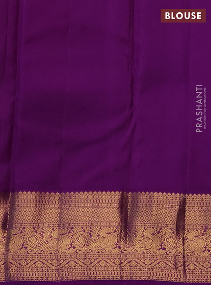 Pure kanchipuram silk saree teal green and purple with allover zari woven brocade weaves and zari woven korvai border