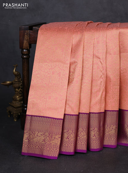 Pure kanchipuram silk saree peach shade and purple with allover zari woven brocade weaves and zari woven korvai border