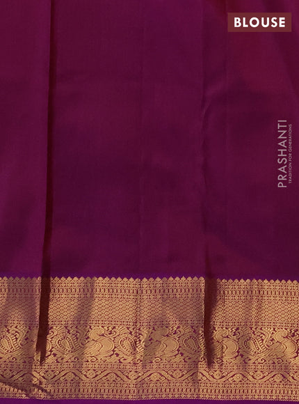 Pure kanchipuram silk saree peach shade and purple with allover zari woven brocade weaves and zari woven korvai border