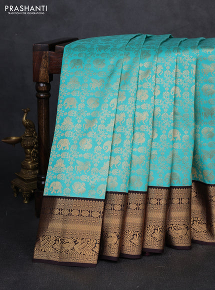 Pure kanchipuram silk saree teal blue and deep wine with allover zari woven brocade weaves and zari woven border