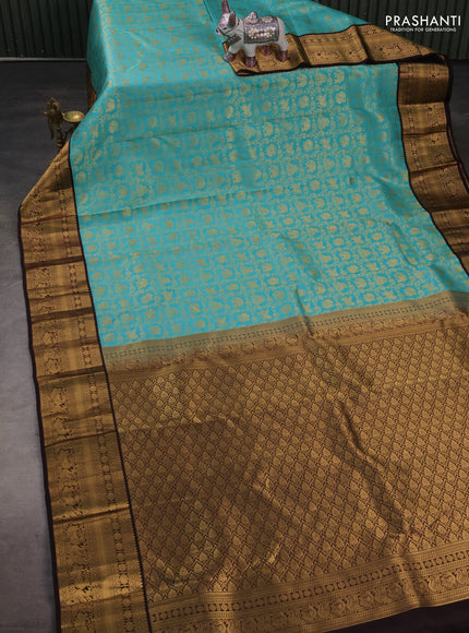 Pure kanchipuram silk saree teal blue and deep wine with allover zari woven brocade weaves and zari woven border