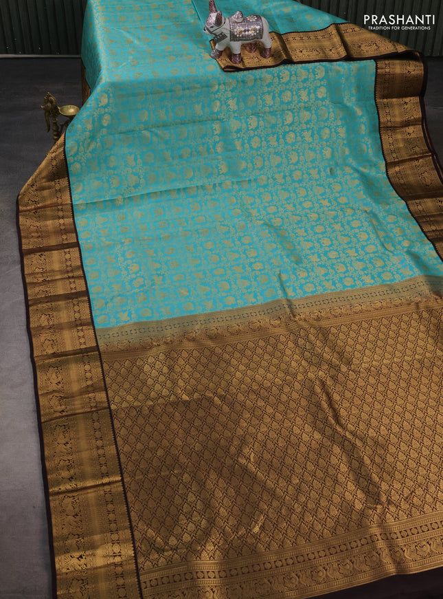 Pure kanchipuram silk saree teal blue and deep wine with allover zari woven brocade weaves and zari woven border