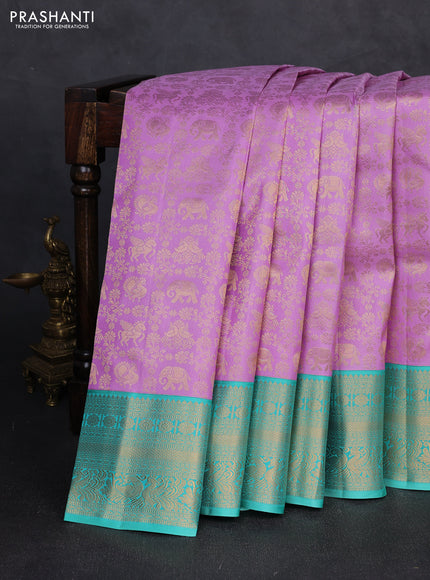 Pure kanchipuram silk saree lavender and teal green with allover zari woven brocade weaves and zari woven border