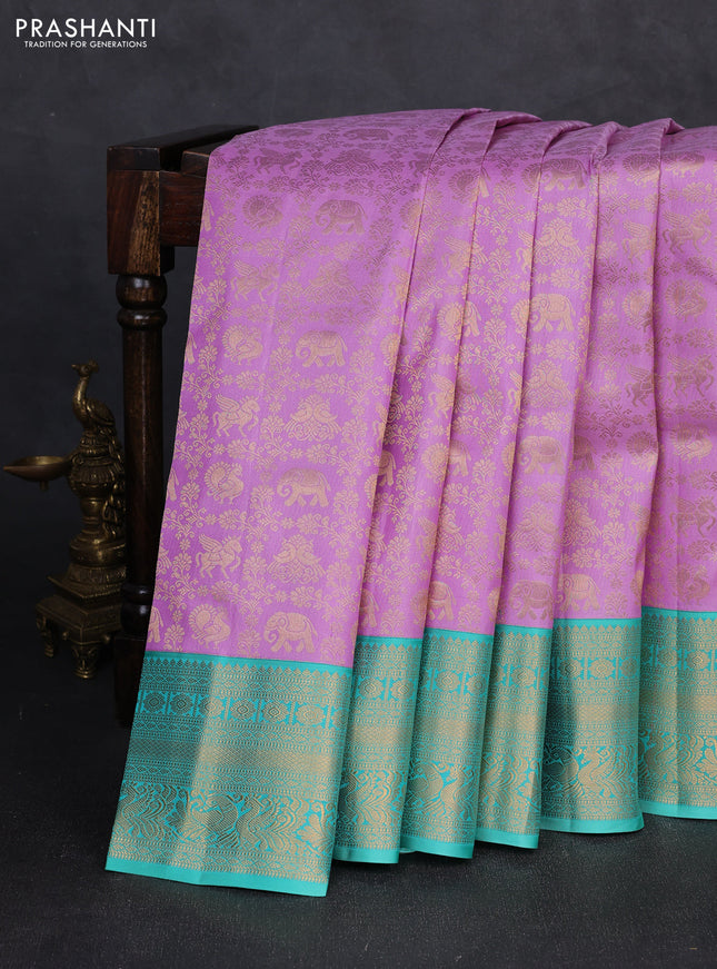 Pure kanchipuram silk saree lavender and teal green with allover zari woven brocade weaves and zari woven border