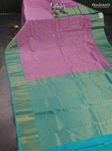 Pure kanchipuram silk saree lavender and teal green with allover zari woven brocade weaves and zari woven border