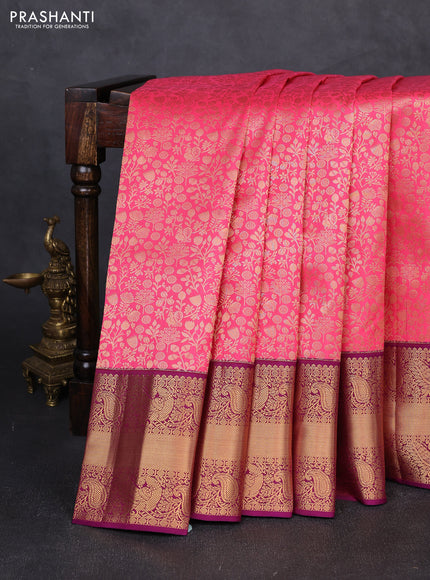 Pure kanchipuram silk saree pink and purple with allover zari woven brocade weaves and rich zari woven korvai border