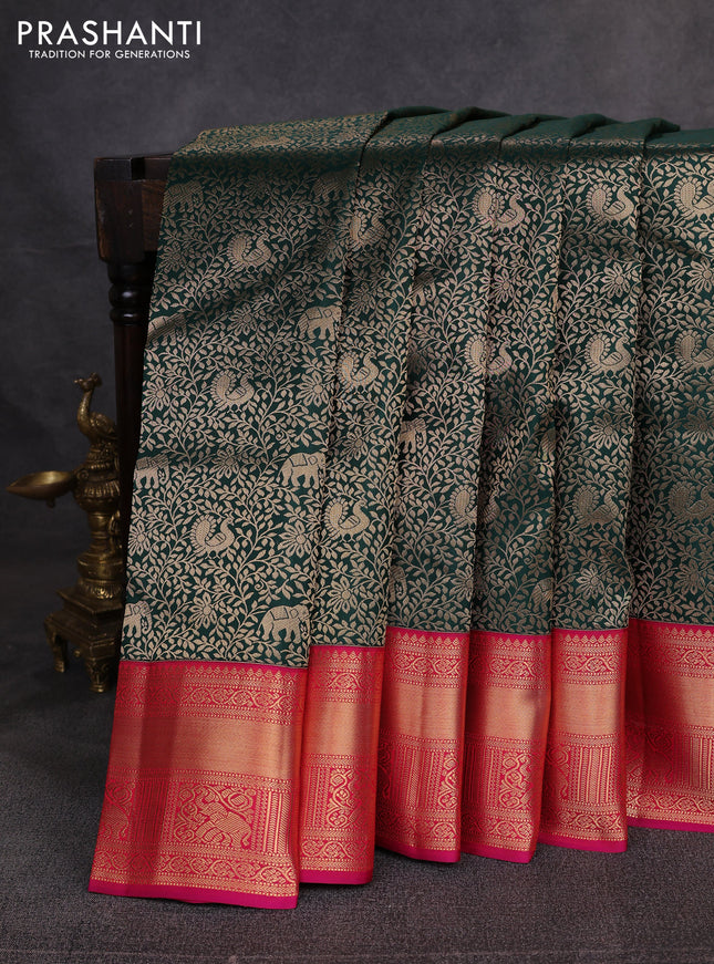 Pure kanchipuram silk saree bottle green and pink with allover zari woven brocade weaves and rich zari woven korvai border